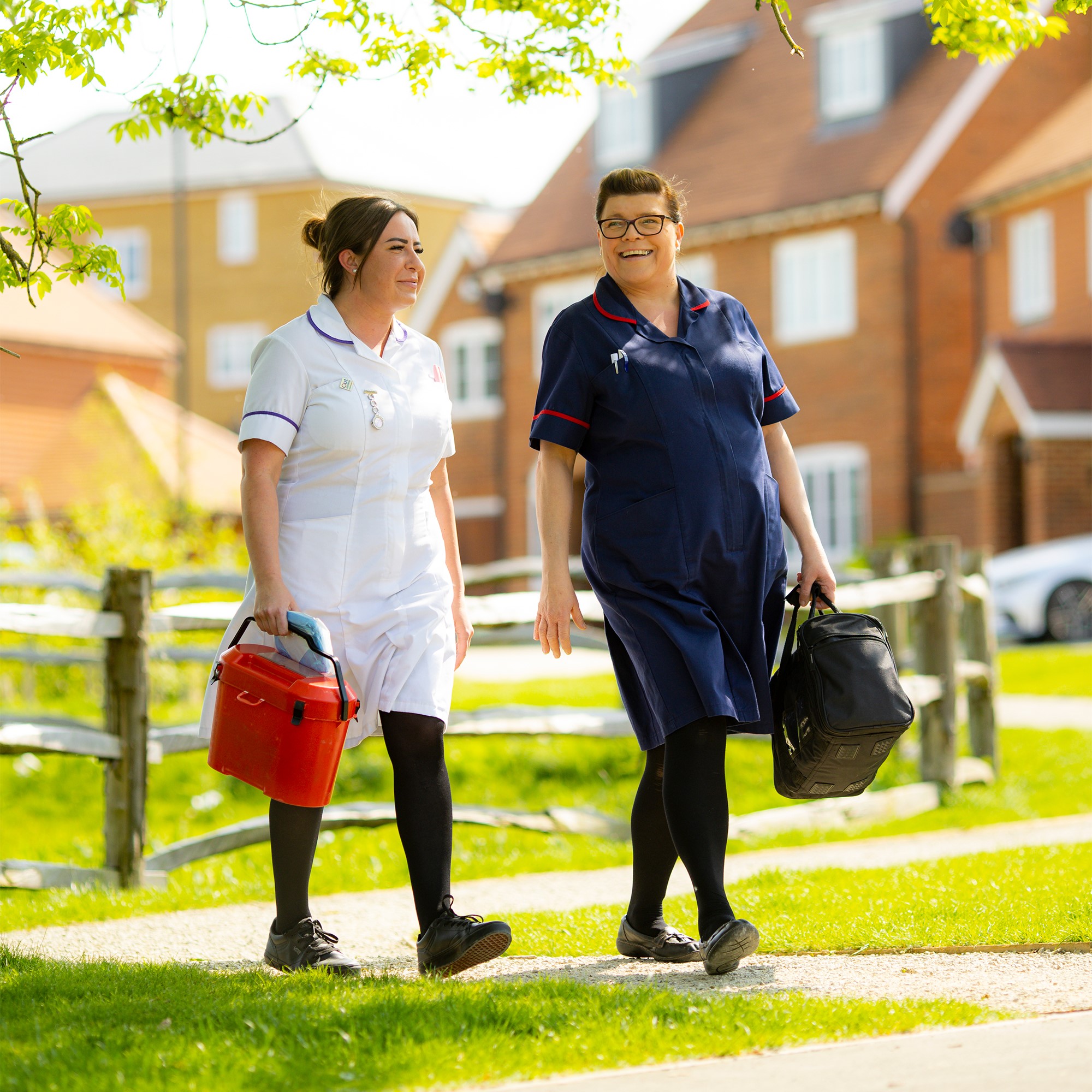 Graphic showing two nurses walking after visiting a patient at home.